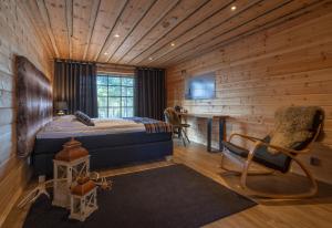 Postel nebo postele na pokoji v ubytování Wilderness Hotel Nangu & Igloos