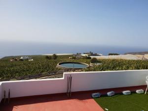 a view of the ocean from the balcony of a house at Casa Angel y Carmen (La Dama, La Gomera) in El Cercado