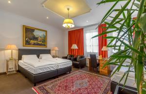 Postel nebo postele na pokoji v ubytování Hotel Adler