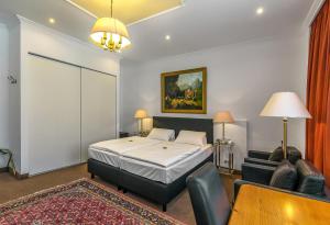 Postel nebo postele na pokoji v ubytování Hotel Adler