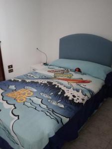 La Scaletta Casa Vacanze tesisinde bir odada yatak veya yataklar