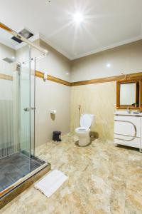 Ein Badezimmer in der Unterkunft Ogix Cliff Paradise