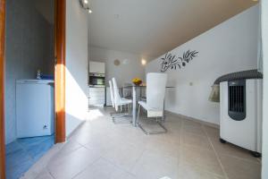 Kuchyň nebo kuchyňský kout v ubytování Strma Apartments