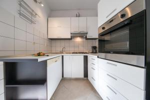 Kuchyň nebo kuchyňský kout v ubytování Strma Apartments