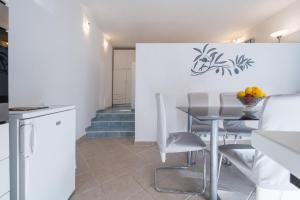 Kuchyň nebo kuchyňský kout v ubytování Strma Apartments