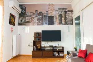 TV a/nebo společenská místnost v ubytování Lianos Apartments Business Class A