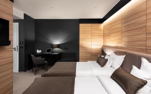 Krevet ili kreveti u jedinici u okviru objekta Hotel Del Corso