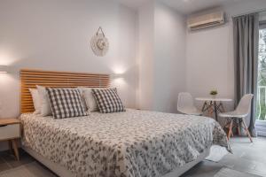 Postel nebo postele na pokoji v ubytování Andros Blue