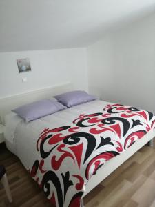 Postel nebo postele na pokoji v ubytování Apartmani Island
