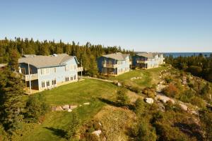 an aerial view of a large estate with houses at Condos-Hotels Natakam, Communauté Autochtone in Les Escoumins