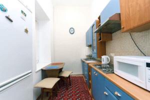 Kuchyňa alebo kuchynka v ubytovaní Great one bed on Mykhaylovskaya str