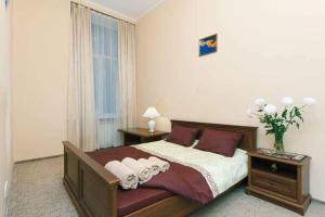 Posteľ alebo postele v izbe v ubytovaní Great one bed on Mykhaylovskaya str