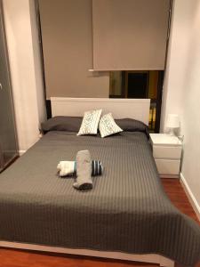 ムルシアにあるMurcia Centroのベッド1台(タオル2枚、枕2つ付)
