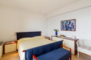 Posteľ alebo postele v izbe v ubytovaní Fontana Vecchia Seaview Apartment