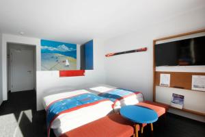 Postel nebo postele na pokoji v ubytování Hotel Elite