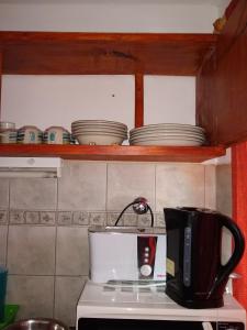 Dapur atau dapur kecil di Laguna Verde Departamentos