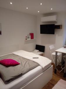 Postel nebo postele na pokoji v ubytování Apartment EMA