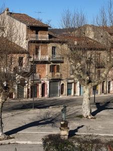 an old building with a fire hydrant in front of it at Boutique Hotel Palazzo Corso Umberto in Boiano