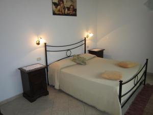 Ein Bett oder Betten in einem Zimmer der Unterkunft Agriturismo L'Oca di Montemerano Terme di Saturnia