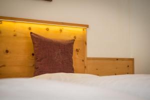 Voodi või voodid majutusasutuse Hotel Alpenrast toas