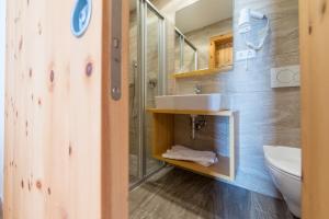 Vannituba majutusasutuses Hotel Alpenrast