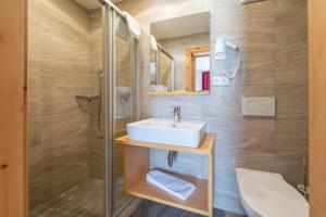 Vannituba majutusasutuses Hotel Alpenrast