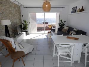 A seating area at Apartamentos Medano - Duplex Sea Views
