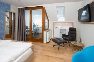 TV a/nebo společenská místnost v ubytování Hotel Restaurant Seehalde