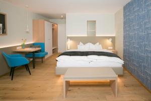 Postel nebo postele na pokoji v ubytování Hotel Restaurant Seehalde