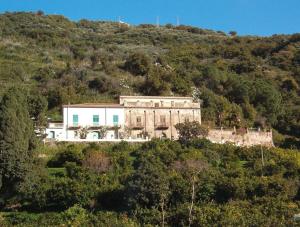 an old house on the side of a hill at Villa Caferì in Porto San Giorgio