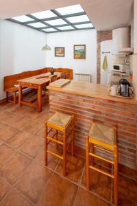 A kitchen or kitchenette at Rincón de piedra BCN