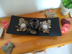 a table with cookies and candles on top of it at mare di zante "mare di levante" in Alikanas +45 photos