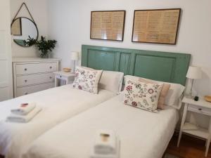 Łóżko lub łóżka w pokoju w obiekcie Apartamento Vive en Maravillas