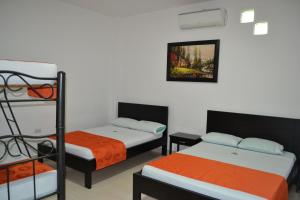 Ένα ή περισσότερα κρεβάτια σε δωμάτιο στο Hotel la Colina