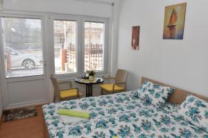 Postel nebo postele na pokoji v ubytování Apartment Elmari