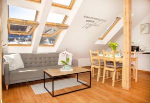 Posedenie v ubytovaní Apartament w Rynku
