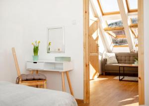 Posteľ alebo postele v izbe v ubytovaní Apartament w Rynku