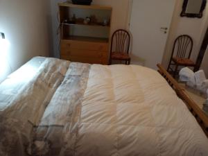 Ένα ή περισσότερα κρεβάτια σε δωμάτιο στο casa padre Jerone