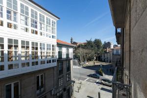 a view of a city street from a building at Luxury apartment-free parking in Santiago de Compostela