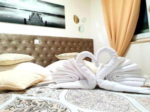 Postel nebo postele na pokoji v ubytování Luxury Apartment Sweet Dreams