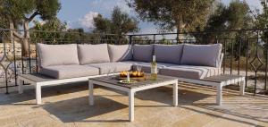A seating area at Trullo la perla di pietra