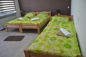 Cama ou camas em um quarto em Prenoćište M&A