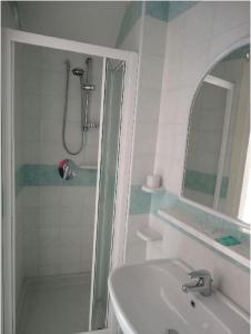 Koupelna v ubytování Hotel Candia