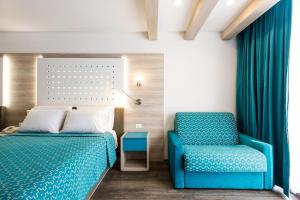 Una cama o camas en una habitación de Hotel Casa Blanca