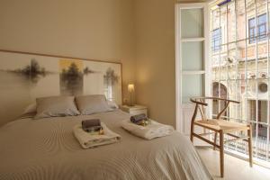 A bed or beds in a room at Apartamento Centro San Luis