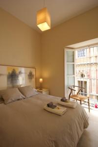A bed or beds in a room at Apartamento Centro San Luis