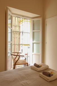 A bed or beds in a room at Apartamento Centro San Luis