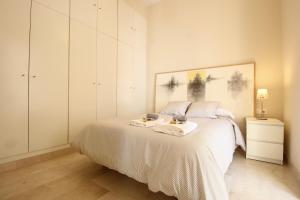 A bed or beds in a room at Apartamento Centro San Luis