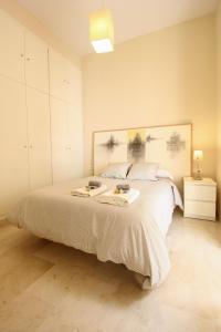 A bed or beds in a room at Apartamento Centro San Luis