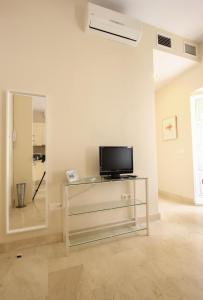 A television and/or entertainment centre at Apartamento Centro San Luis